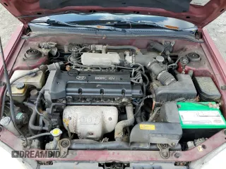 1999 Hyundai Elantra z VIN KMHJW35F0XU129498, wystawiony jako Copart lot #74481134 z przebiegiem 72 123 mil mil oraz Czysty tytuł • Clean title. Historia ofert i sprzedaży dostępna na DreamBid. Obrazek 11.