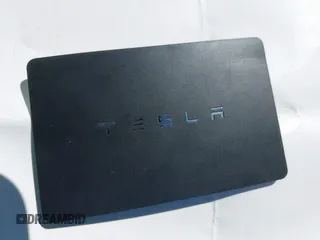 2019 Tesla Model 3 Mid Range with VIN 5YJ3E1EA0KF425079, listed as a IAAI auction lot 41871022 with 61,684 mi miles and . Bid and sale history available at DreamBid. Image 11.