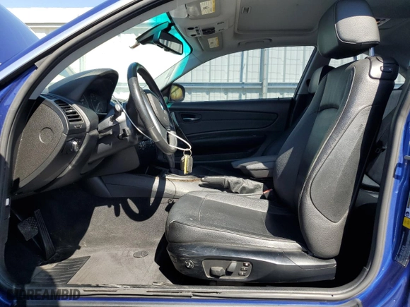 2012 BMW 1 Series 128i with VIN WBAUP7C56CVP23403, listed as a Copart auction lot 59088734 with 113,600 mi miles and Clean Title. Bid and sale history available at carsss.com. Image 7.