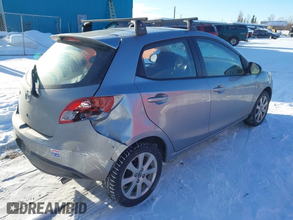 2013 Mazda 2 Touring z VIN JM1DE1LYXD0153291, wystawiony jako IAAI lot #41671574 z przebiegiem Nie podano mil oraz . Historia ofert i sprzedaży dostępna na DreamBid. Obrazek 4.