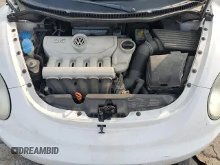 2010 Volkswagen Beetle with VIN 3VWPW3AG0AM027009, listed as a Copart auction lot 60617775 with 113,078 mi miles and Salvage title. Bid and sale history available at DreamBid. Image 11.