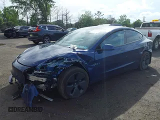 2022 Tesla Model 3 Long Range z VIN 5YJ3E1EB2NF193808, wystawiony jako IAAI lot #42281993 z przebiegiem 40 340 mil mil oraz . Historia ofert i sprzedaży dostępna na DreamBid. Obrazek 2.