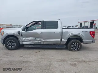 2023 Ford F-150 XL with VIN 1FTFW1E51PFB56848, listed as a IAAI auction lot 42067155 with 56,936 mi miles. Bid and sale history available at carsss.com. Image 14.