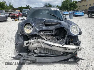 2006 MINI Convertible S z VIN WMWRH335X6TF87128, wystawiony jako Copart lot #51917565 z przebiegiem 91 741 mil mil oraz Szkoda całkowita • Salvage title. Historia ofert i sprzedaży dostępna na DreamBid. Obrazek 5.