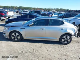 2013 Kia Optima Hybrid EX with VIN KNAGM4AD8D5039338, listed as a IAAI auction lot 41077342 with 1 mi miles. Bid and sale history available at carsss.com. Image 13.