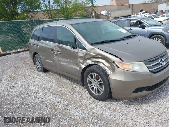 2013 Honda Odyssey EX-L with VIN 5FNRL5H65DB064238, listed as a IAAI auction lot 42050743 with 189,437 mi miles and . Bid and sale history available at carsss.com. Image 1.