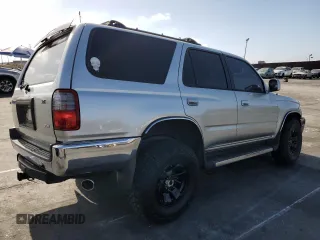 2000 Toyota 4Runner SR5 z VIN JT3GN86R4Y0159902, wystawiony jako Copart lot #57287845 z przebiegiem 174 742 mil mil oraz Szkoda całkowita • Salvage title. Historia ofert i sprzedaży dostępna na DreamBid. Obrazek 3.