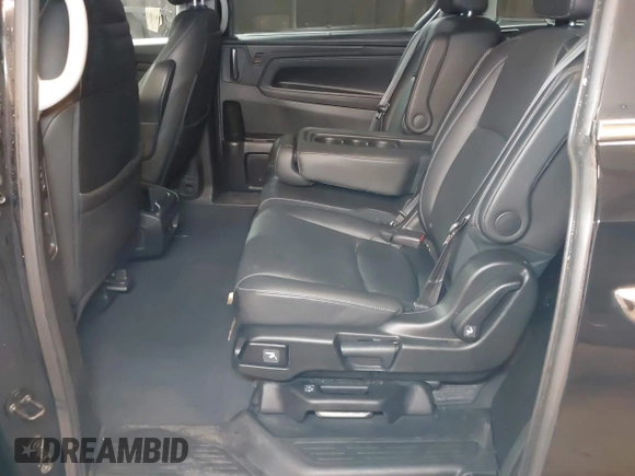 2021 Honda Odyssey Touring with VIN 5FNRL6H83MB040138, listed as a IAAI auction lot 39150096 with 61,322 mi miles and . Bid and sale history available at DreamBid. Image 8.