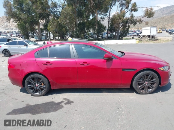 2017 Jaguar XE 25t Prestige with VIN SAJAE4BG6HA947400, listed as a IAAI auction lot 41697309 with 112,862 mi miles. Bid and sale history available at carsss.com. Image 13.