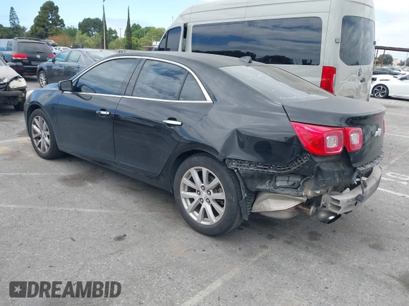 2013 Chevrolet Malibu LTZ with VIN 1G11H5SA2DU125573, listed as a IAAI auction lot 42047422 with 165,493 mi miles and . Bid and sale history available at DreamBid. Image 3.