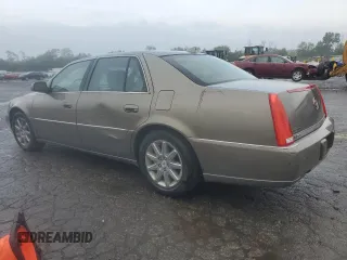 2010 Cadillac DTS 1SD z VIN 1G6KH5EY6AU126664, wystawiony jako Copart lot #58533225 z przebiegiem Nie podano mil oraz Szkoda całkowita • Salvage title. Historia ofert i sprzedaży dostępna na DreamBid. Obrazek 2.