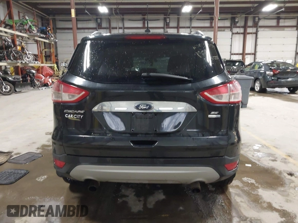 2015 Ford Escape SE with VIN 1FMCU9G91FUC49902, listed as a IAAI auction lot 41947883 with 140,670 mi miles. Bid and sale history available at carsss.com. Image 16.
