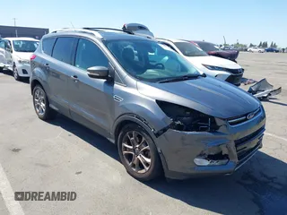 2014 Ford Escape Titanium с VIN 1FMCU0J95EUC22897, выставлен на аукционе IAAI как лот 42204135 с пробегом 144 534 миль миль и . История ставок и продаж доступна на DreamBid. Изображение 1.