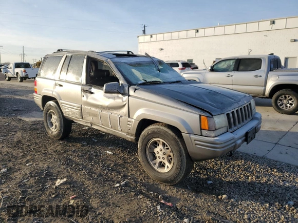 1998 Jeep Grand Cherokee Limited с VIN 1J4GZ78Y0WC260231, выставлен на аукционе Copart как лот 85149724 с пробегом 203 258 миль миль и Списание • Salvage title. История ставок и продаж доступна на DreamBid. Изображение 4.