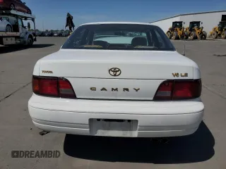 1996 Toyota Camry LE z VIN JT2BF12K2T0132606, wystawiony jako Copart lot #55530625 z przebiegiem 275 455 mil mil oraz Szkoda całkowita • Salvage title. Historia ofert i sprzedaży dostępna na DreamBid. Obrazek 6.