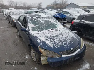 2003 Toyota Camry LE z VIN 4T1BF32K73U055352, wystawiony jako IAAI lot #38989713 z przebiegiem 155 688 mil mil oraz . Historia ofert i sprzedaży dostępna na DreamBid. Obrazek 6.