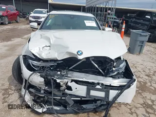 2021 BMW 3 Series 330i with VIN 3MW5R1J09M8C08399, listed as a IAAI auction lot 42483945 with 16,049 mi miles and . Bid and sale history available at DreamBid. Image 12.