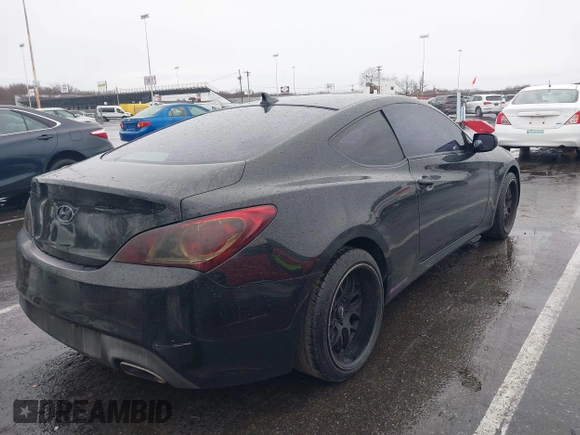2011 Hyundai Genesis Coupe with VIN KMHHT6KD6BU056612, listed as a IAAI auction lot 41872721 with 143,137 mi miles and . Bid and sale history available at DreamBid. Image 4.