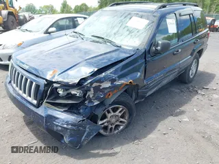 2004 Jeep Grand Cherokee Laredo with VIN 1J4GW48N94C407642, listed as a IAAI auction lot 42381436 with 177,141 mi miles and . Bid and sale history available at DreamBid. Image 6.
