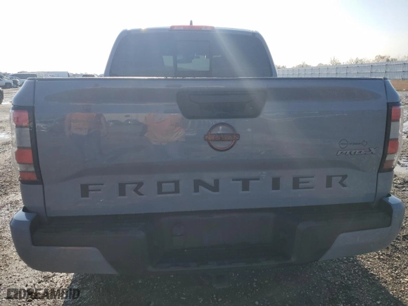 2022 Nissan Frontier PRO-X with VIN 1N6ED1EJ8NN609619, listed as a Copart auction lot 86608994 with 76,078 mi miles and Salvage Title. Bid and sale history available at carsss.com. Image 6.