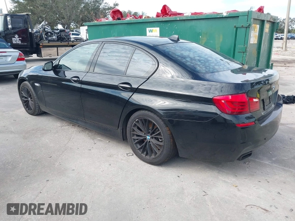 2013 BMW 5 Series 550i xDrive with VIN WBAFU9C56DDY70485, listed as a IAAI auction lot 41276612 with 116,452 mi miles and . Bid and sale history available at carsss.com. Image 3.