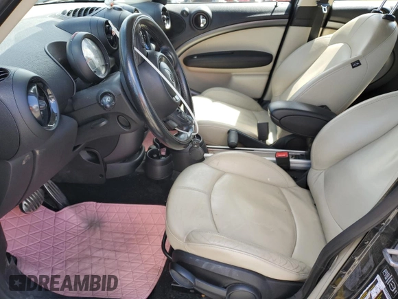 2013 MINI Countryman S ALL4 z VIN WMWZC5C56DWP33270, wystawiony jako Copart lot #56804085 z przebiegiem 141 637 mil mil oraz Szkoda całkowita • Salvage title. Historia ofert i sprzedaży dostępna na DreamBid. Obrazek 7.