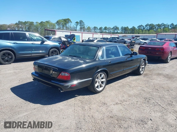 2000 Jaguar XJ with VIN SAJDA15B2YMF14634, listed as a IAAI auction lot 41827953 with 111,505 mi miles and . Bid and sale history available at DreamBid. Image 4.