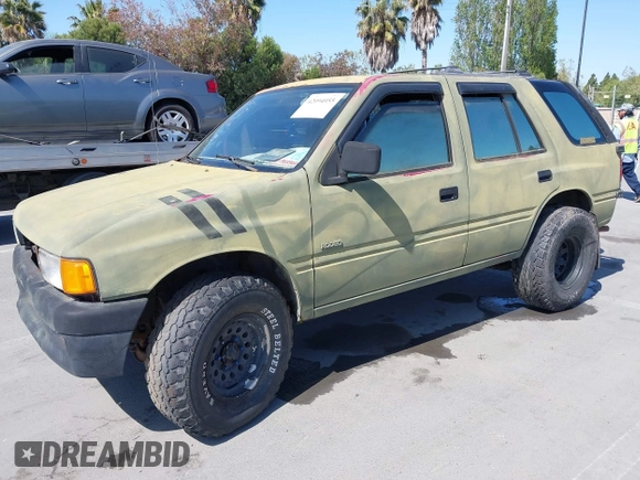 1995 Isuzu Rodeo z VIN 4S2CK58E5S4379419, wystawiony jako IAAI lot #42094055 z przebiegiem 196 175 mil mil oraz . Historia ofert i sprzedaży dostępna na DreamBid. Obrazek 2.