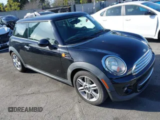 2011 MINI Hardtop with VIN WMWSU3C56BT093420, listed as a IAAI auction lot 41704260 with 142,408 mi miles and . Bid and sale history available at DreamBid. Image 1.