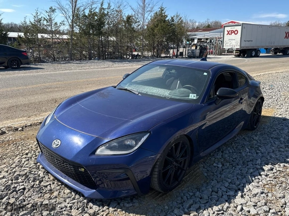 2023 Toyota GR86 Premium with VIN JF1ZNBE12P9754891, listed as a Copart auction lot 51163715 with 11,115 mi miles and Salvage Title. Bid and sale history available at carsss.com. Image 2.