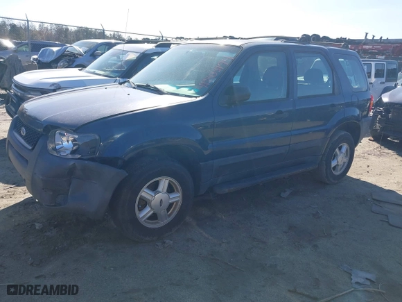 2003 Ford Escape XLS Popular with VIN 1FMYU02133KA02990, listed as a IAAI auction lot 41803174 with 140,792 mi miles. Bid and sale history available at carsss.com. Image 16.