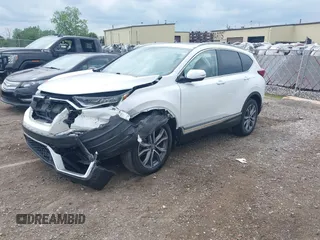 2021 Honda CR-V Touring with VIN 5J6RW2H93ML012016, listed as a IAAI auction lot 42365715 with 55,114 mi miles and . Bid and sale history available at DreamBid. Image 2.