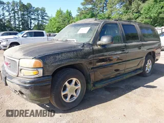2003 GMC Yukon XL Denali with VIN 1GKFK66U43J248482, listed as a IAAI auction lot 42073907 with 286,896 mi miles. Bid and sale history available at carsss.com. Image 2.