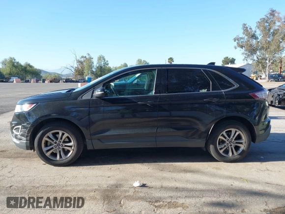 2015 Ford Edge SEL with VIN 2FMTK3J85FBB34115, listed as a IAAI auction lot 41813644 with 143,099 mi miles. Bid and sale history available at carsss.com. Image 14.