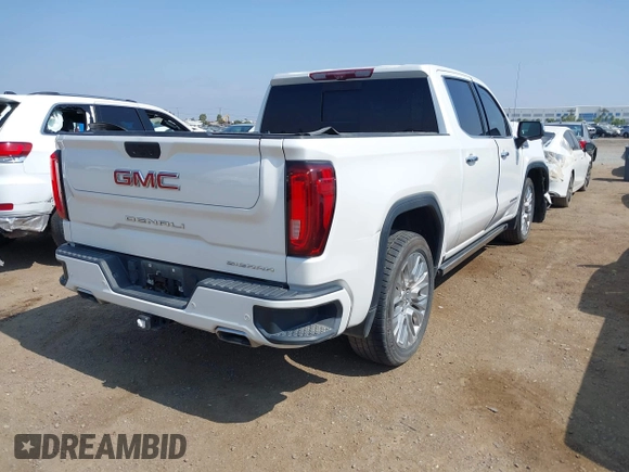 2021 GMC Sierra 1500 Denali z VIN 3GTU9FEL1MG349215, wystawiony jako IAAI lot #42585810 z przebiegiem 97 465 mil mil oraz . Historia ofert i sprzedaży dostępna na DreamBid. Obrazek 4.
