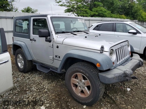 2008 Jeep Wrangler X z VIN 1J4FA24168L629174, wystawiony jako Copart lot #61199205 z przebiegiem 116 307 mil mil oraz Szkoda całkowita • Salvage title. Historia ofert i sprzedaży dostępna na DreamBid. Obrazek 4.