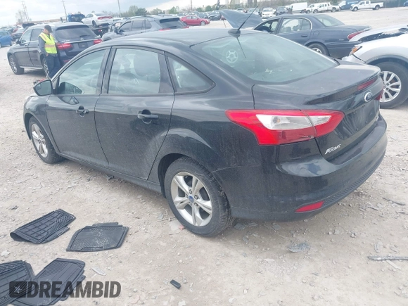 2013 Ford Focus SE with VIN 1FADP3F25DL209199, listed as a IAAI auction lot 42086573 with 136,999 mi miles. Bid and sale history available at carsss.com. Image 3.
