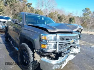 2015 Chevrolet Silverado 1500 LT with VIN 3GCUKREC9FG517787, listed as a IAAI auction lot 41400803 with 254,489 mi miles and . Bid and sale history available at DreamBid. Image 1.
