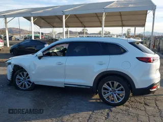 2021 Mazda CX-9 Signature with VIN JM3TCBEY6M0536883, listed as a IAAI auction lot 41388130 with 65,613 mi miles. Bid and sale history available at carsss.com. Image 14.
