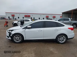 2016 Ford Focus SE with VIN 1FADP3F25GL312269, listed as a IAAI auction lot 41586489 with 76,216 mi miles. Bid and sale history available at carsss.com. Image 14.