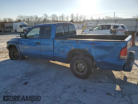 1999 Dodge Dakota SLT with VIN 1B7GL22X5XS321879, listed as a Copart auction lot 84015834 with 210,252 mi miles and Salvage Title. Bid and sale history available at carsss.com. Image 2.