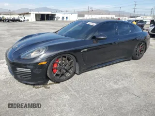 2014 Porsche Panamera Turbo z VIN WP0AC2A72EL073234, wystawiony jako Copart lot #65813464 z przebiegiem 83 918 mil mil oraz Szkoda całkowita • Salvage title. Historia ofert i sprzedaży dostępna na DreamBid. Obrazek 1.