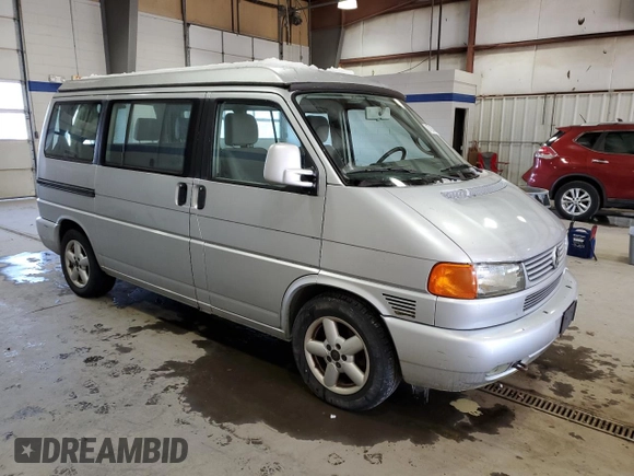 2003 Volkswagen EuroVan MV с VIN WV2NB47073H001005, выставлен на аукционе Copart как лот 87284844 с пробегом 283 979 миль миль и Чистый • Clean title. История ставок и продаж доступна на DreamBid. Изображение 4.