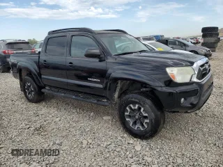 2014 Toyota Tacoma with VIN 3TMLU4EN8EM145918, listed as a Copart auction lot 60435105 with 121,046 mi miles and Salvage title. Bid and sale history available at DreamBid. Image 4.