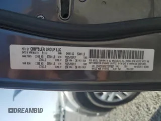 2014 Dodge Journey American Value with VIN 3C4PDCABXET277897, listed as a Copart auction lot 60566735 with 113,343 mi miles and Salvage title. Bid and sale history available at DreamBid. Image 13.