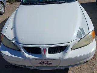 2005 Pontiac Grand Am SE with VIN 1G2NE52E05M215976, listed as a IAAI auction lot 42025657 with 220,418 mi miles. Bid and sale history available at carsss.com. Image 12.