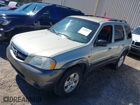 2004 Mazda Tribute LX with VIN 4F2YZ041X4KM23352, listed as a IAAI auction lot 41605357 with 276,243 mi miles and . Bid and sale history available at DreamBid. Image 2.