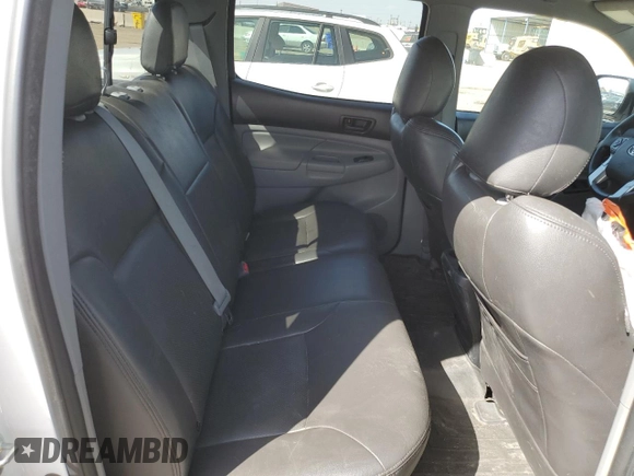 2014 Toyota Tacoma with VIN 3TMLU4EN7EM144839, listed as a Copart auction lot 52728065 with 32,610 mi miles and Salvage Title. Bid and sale history available at DreamBid. Image 10.