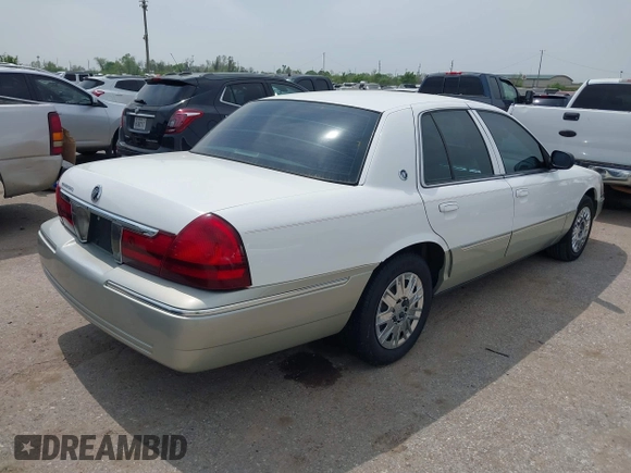 2004 Mercury Grand Marquis GS z VIN 2MEFM74W54X654116, wystawiony jako IAAI lot #41875021 z przebiegiem 129 999 mil mil oraz . Historia ofert i sprzedaży dostępna na DreamBid. Obrazek 4.