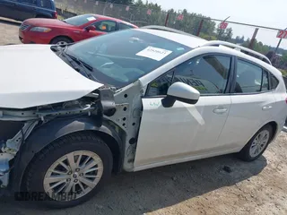 2017 Subaru Impreza Premium z VIN 4S3GTAB61H3718731, wystawiony jako IAAI lot #42520623 z przebiegiem 86 225 mil mil oraz . Historia ofert i sprzedaży dostępna na DreamBid. Obrazek 14.